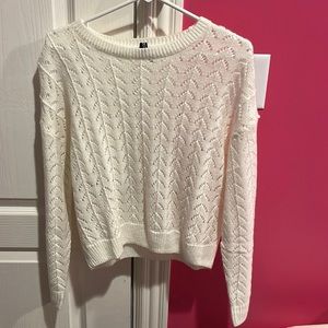 White H&M sweater.